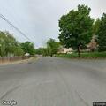 Power lines and tree blocking road at Upland Drive