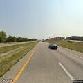 Car passing on shoulder on westbound I-70