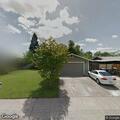 Person banging on house with flashlight in Loomis