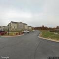 Dumpster fire with light smoke near Dry Creek Road