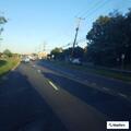 Driver drinking beer while driving eastbound