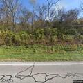 Tree down on utility lines near US 52 address