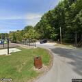 Person experiencing emotional crisis at campground pavilion