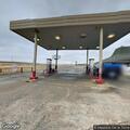 Vehicle smoking at gas pump in Wilson