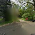 Telephone pole down creating traffic hazard