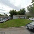 Person experiencing abdominal pain near Grandview