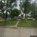 Person with flashlight reported in backyards