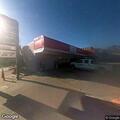Possible drunk drivers in parked truck with beer
