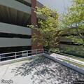 Non-urgent medical call near parking garage entrance