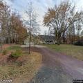 Person making noises in yard at Elm Street home