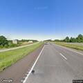 Scrap metal blocking both eastbound lanes on I-70
