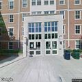 Man waiting outside West Hall after argument