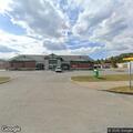 Suspicious men behind medical office building
