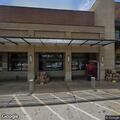 Person experiencing breathing problems at bus stop