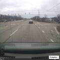 Person shining green laser at cars on US 52