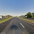 Unconscious person receiving CPR in vehicle on Blue Pkwy