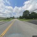 Vehicle rollover crash with injuries on Main Street