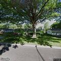 Tree limb touching power line at Overland Park home