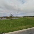 Child sick on sidewalk at field five concession stand