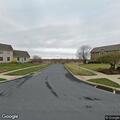 Burglary alarm with person on Cameron Drive lot