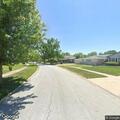 Man about 40 lies mostly immobile on sidewalk in Glenwood