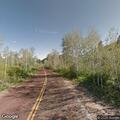 Debris blocking roadway on Colorado Terrace Road