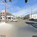 Suspicious man lingering near post office parking area