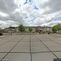 Vehicle leaking fluid in parking lot