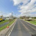 Two-car crash with person trapped near railroad tracks
