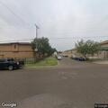 Loose fiber optic cable reported on Travis Street
