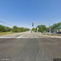 Officers check gray Chevy Malibu at intersection