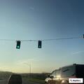 Glass debris blocking roadway at Alexandria Pike