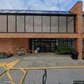 Unresponsive woman breathing in car at grocery store