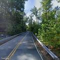 Person with abdominal pain on River Road in Crownsville