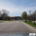 Person walking with allergic reaction near firehouse