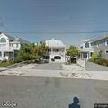 Person experiencing back pain near Stone Harbor