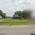 Shed fire fully engulfs structure near trees