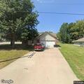 Vehicle crashes into house on West 26th Street