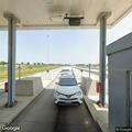 Car hits deer on eastbound interstate shoulder