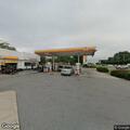 Man rambling and reporting harm to animal at gas station