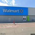 Motorcycle and vehicle crash at Walmart parking lot