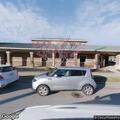 Intoxicated woman vomiting at Scholar House