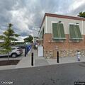 Person experiencing chest pain at bar in Laurel