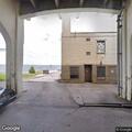 Man sleeping on outdoor air conditioner unit