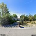 Suspicious car drives around property, takes photos
