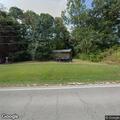 Masked person seen on back porch via camera