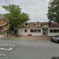 Shirtless man banging on windows at Main Street bar