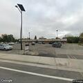 Person with traffic warrant waiting at store