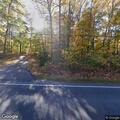 Tree blocking roadway on East Colonial Highway