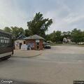 Police check on vehicles at liquor store lot